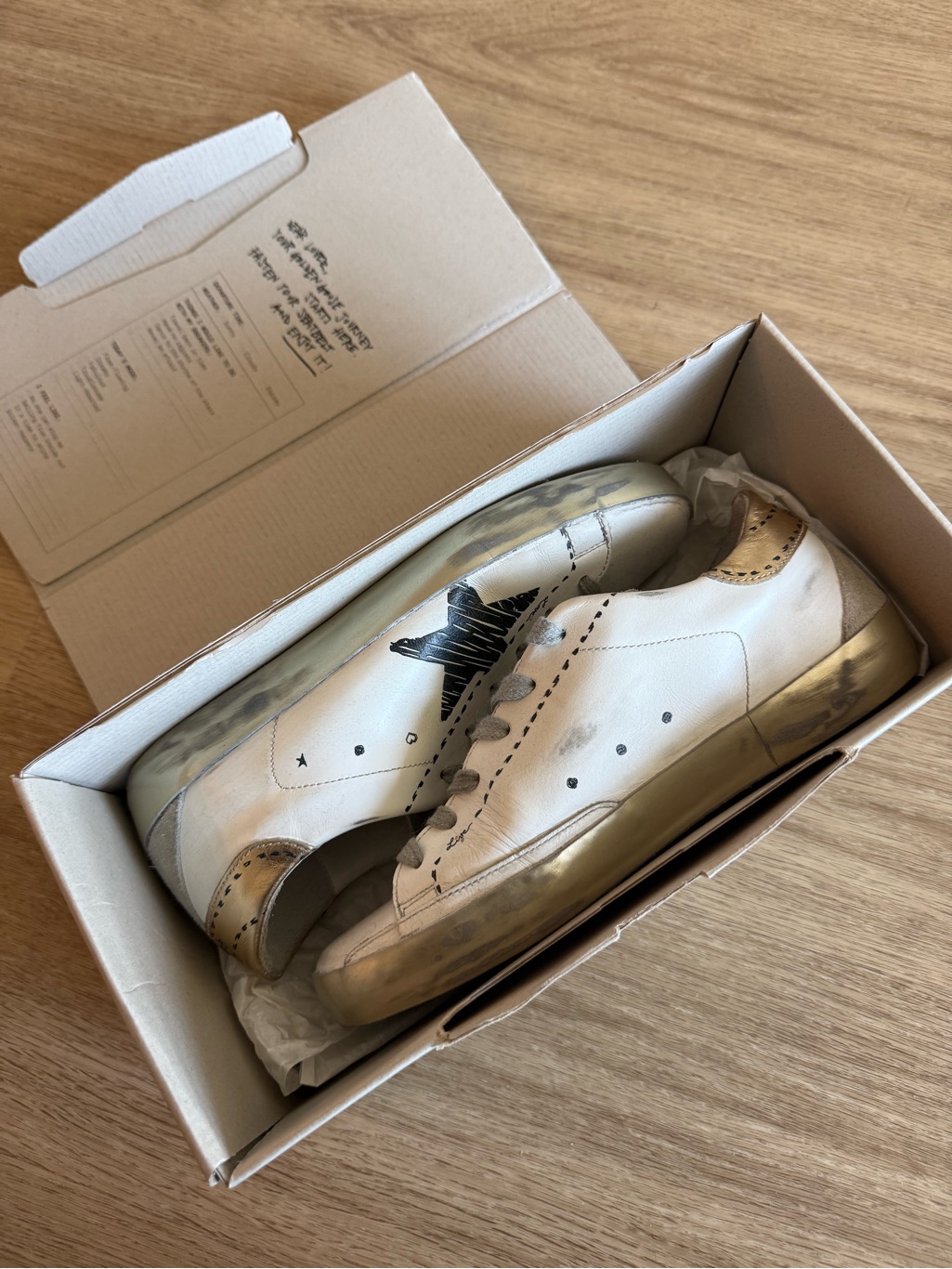 Golden Goose Super-Star Sneakers With Black Star And Distressed Gold Accents